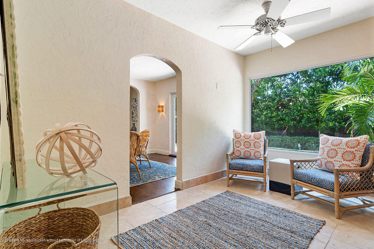 231 Dyer Road West Palm Beach, FL 33405 - Photo 12 of 45 a living room with furniture a lamp and a rug