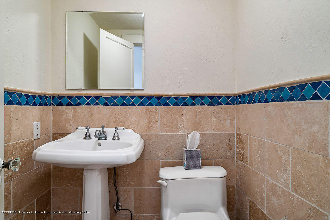 231 Dyer Road West Palm Beach, FL 33405 - Photo 15 of 45 a bathroom with a sink and a mirror