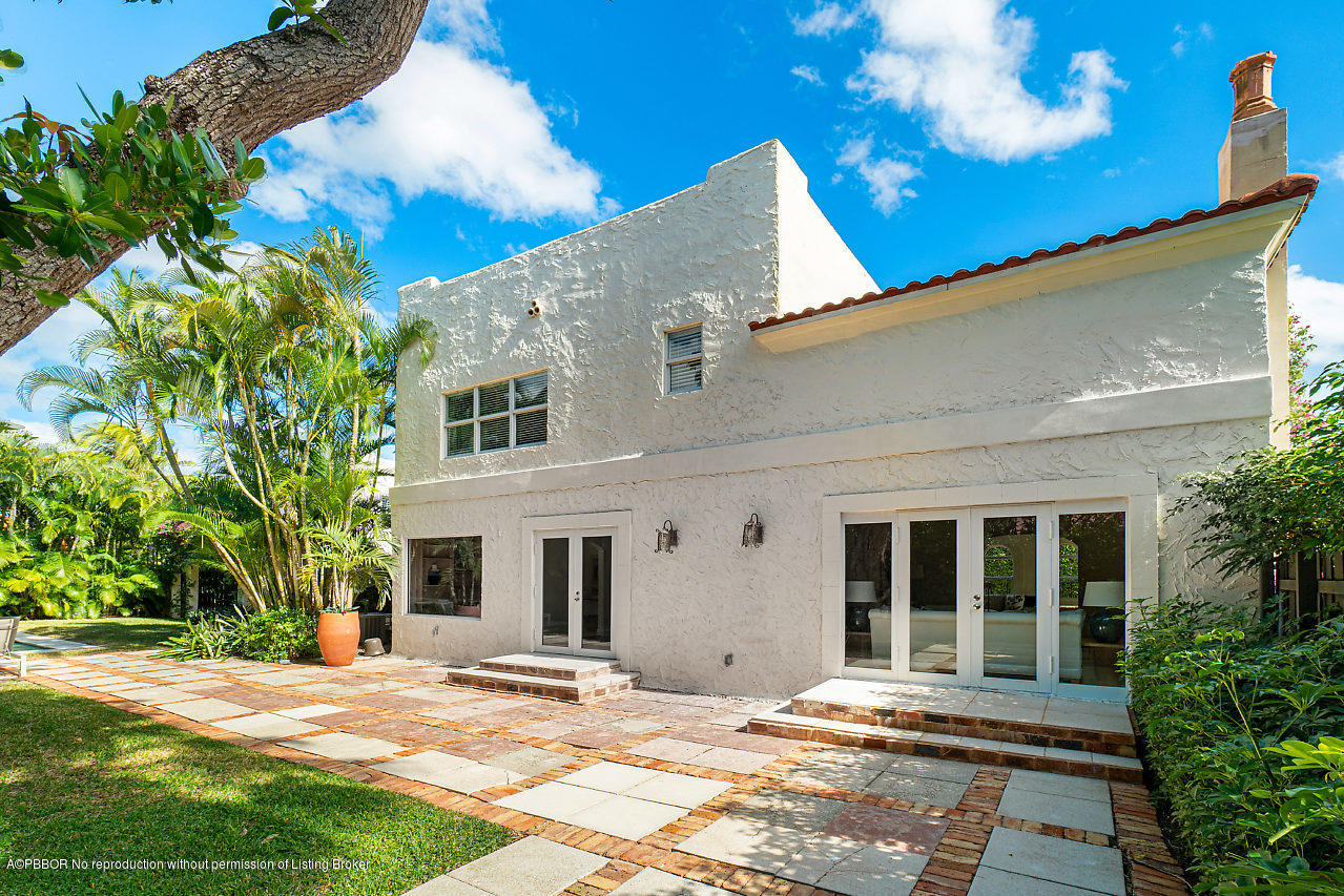 231 Dyer Road West Palm Beach, FL 33405 - Photo 16 of 45 a front view of a house with a yard