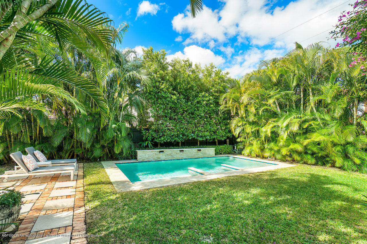 231 Dyer Road West Palm Beach, FL 33405 - Photo 20 of 45 a view of a swimming pool with a yard