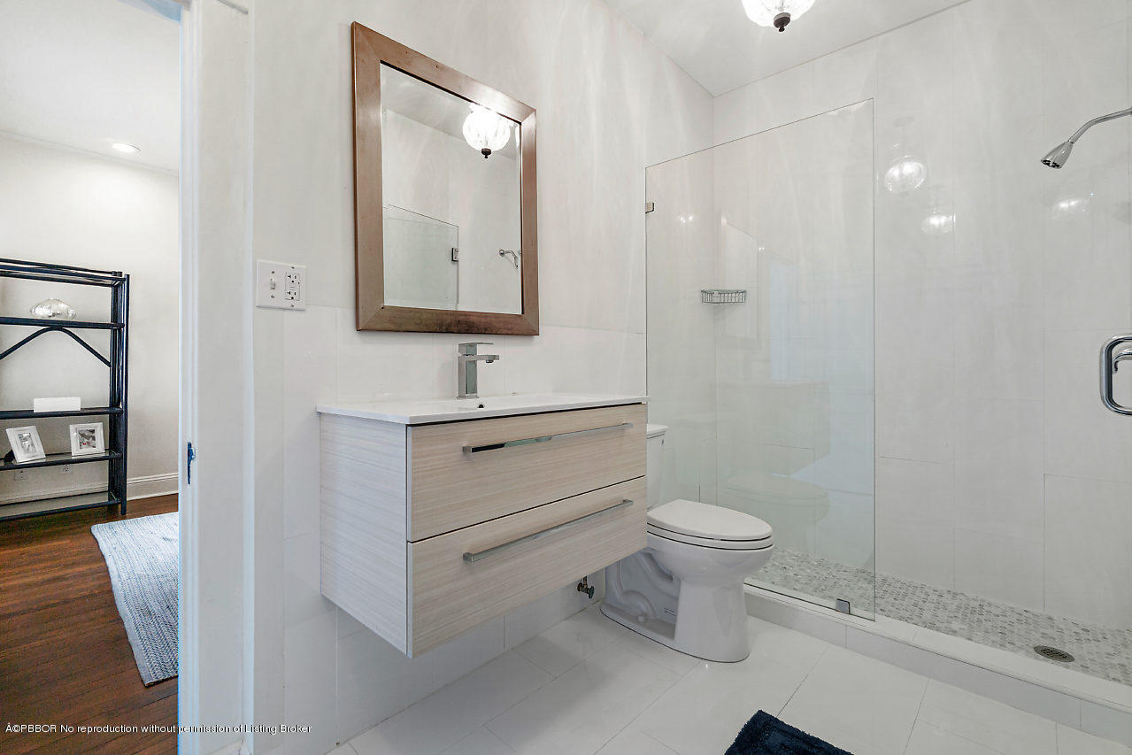 231 Dyer Road West Palm Beach, FL 33405 - Photo 24 of 45 a bathroom with a sink toilet and shower