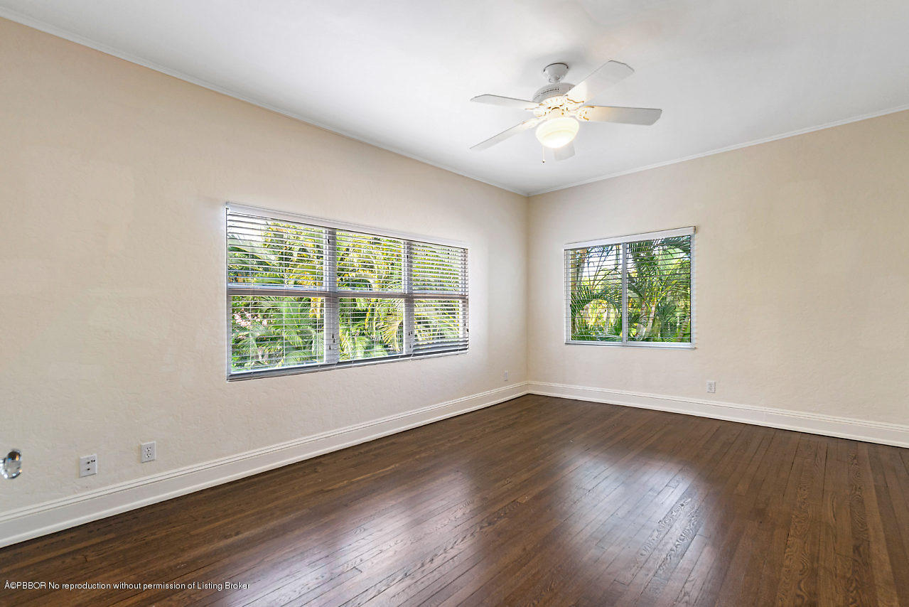 231 Dyer Road West Palm Beach, FL 33405 - Photo 28 of 45 a view of an empty room with wooden floor and a window