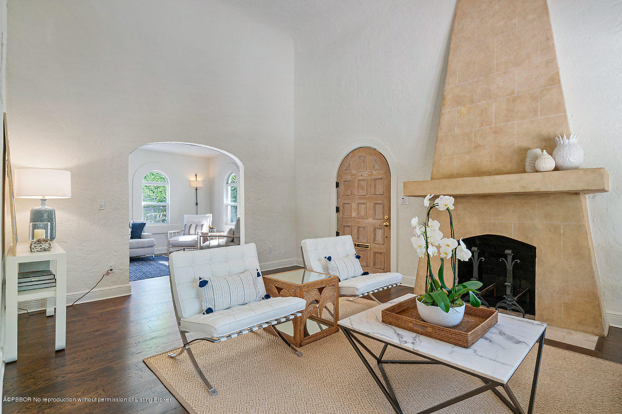 231 Dyer Road West Palm Beach, FL 33405 - Photo 5 of 45 a living room with fireplace furniture and a wooden floor