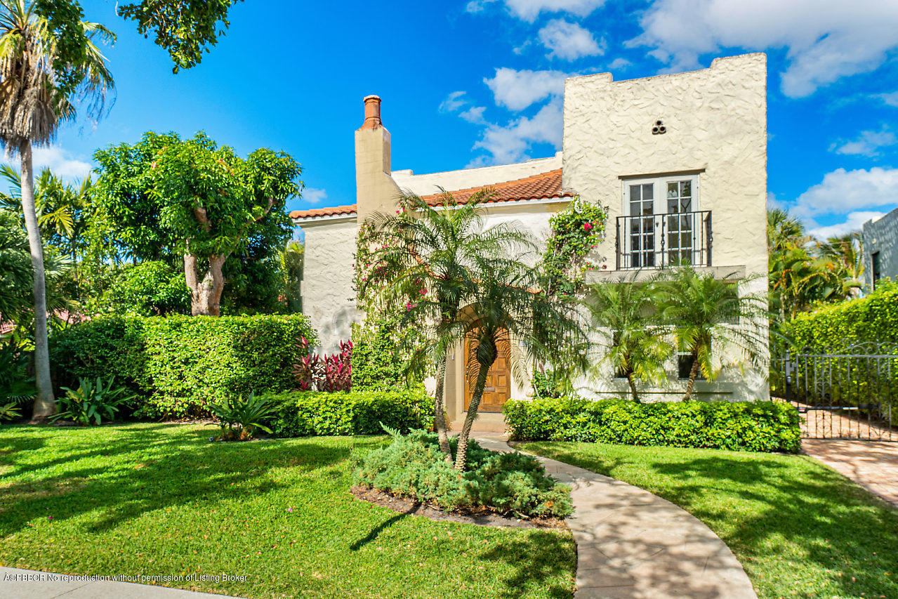 231 Dyer Road West Palm Beach, FL 33405 - Photo 44 of 45 a view of a brick house with a yard and plants