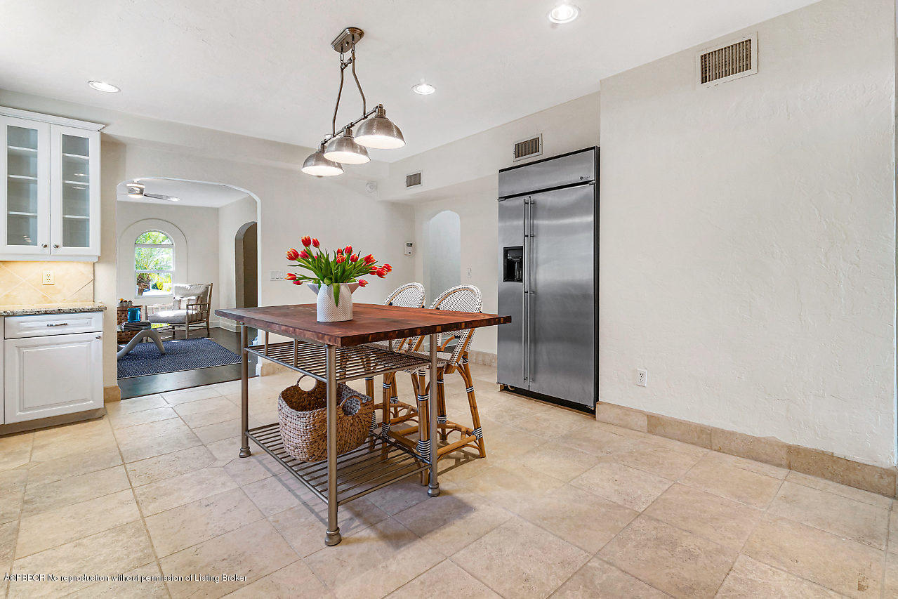231 Dyer Road West Palm Beach, FL 33405 - Photo 9 of 45 a view of a dining room with furniture and a chandelier