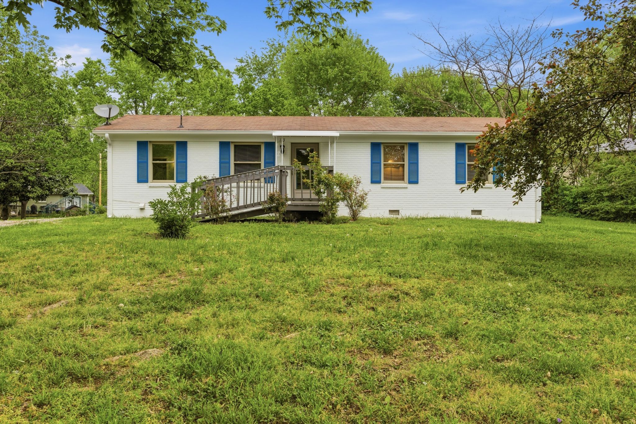 113 Mae Circle Dickson, TN 37055 - Photo 1 of 30 a view of a house with a yard and sitting area