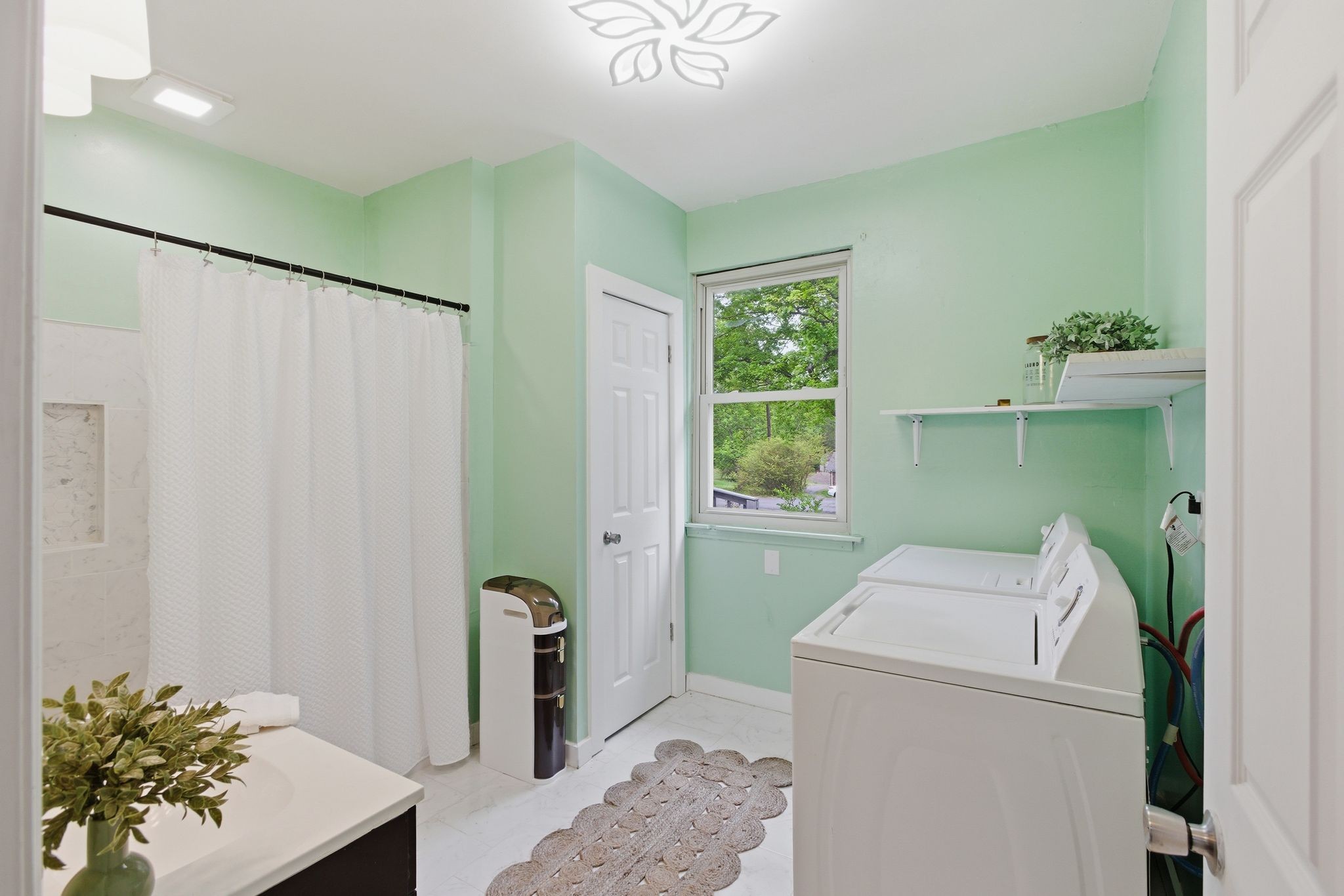 113 Mae Circle Dickson, TN 37055 - Photo 17 of 30 a room with a washer and dryer