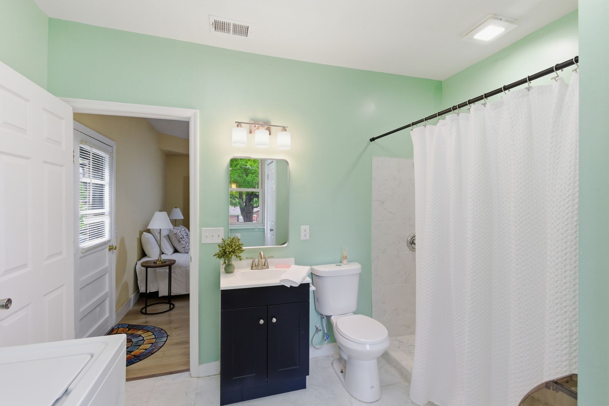 113 Mae Circle Dickson, TN 37055 - Photo 18 of 30 a bathroom with a sink a toilet and shower