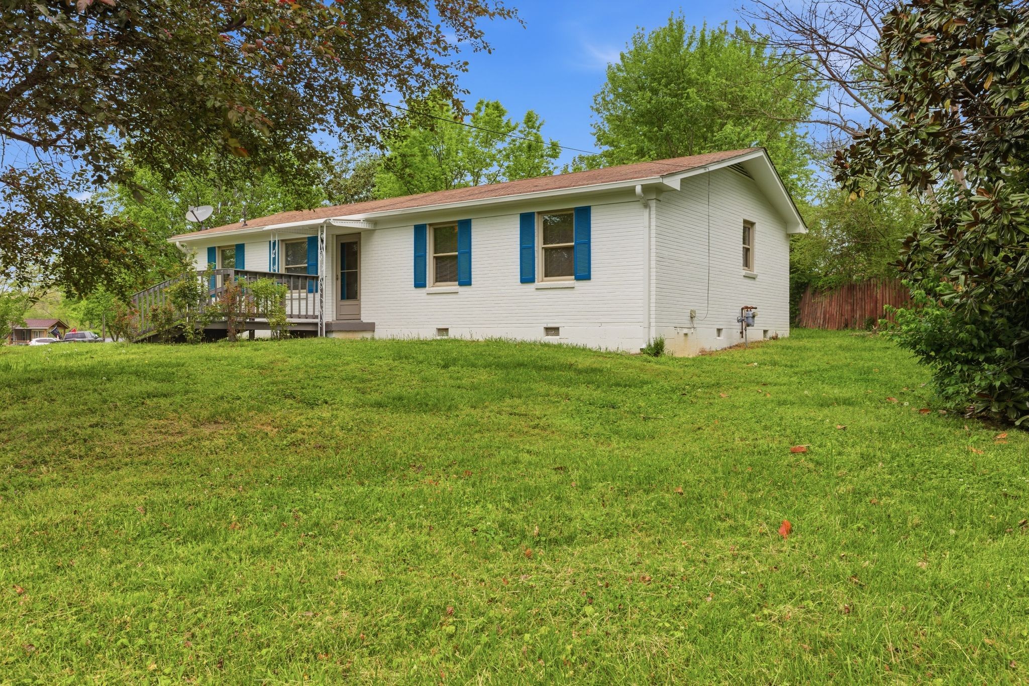 113 Mae Circle Dickson, TN 37055 - Photo 2 of 30 a view of a house with a backyard