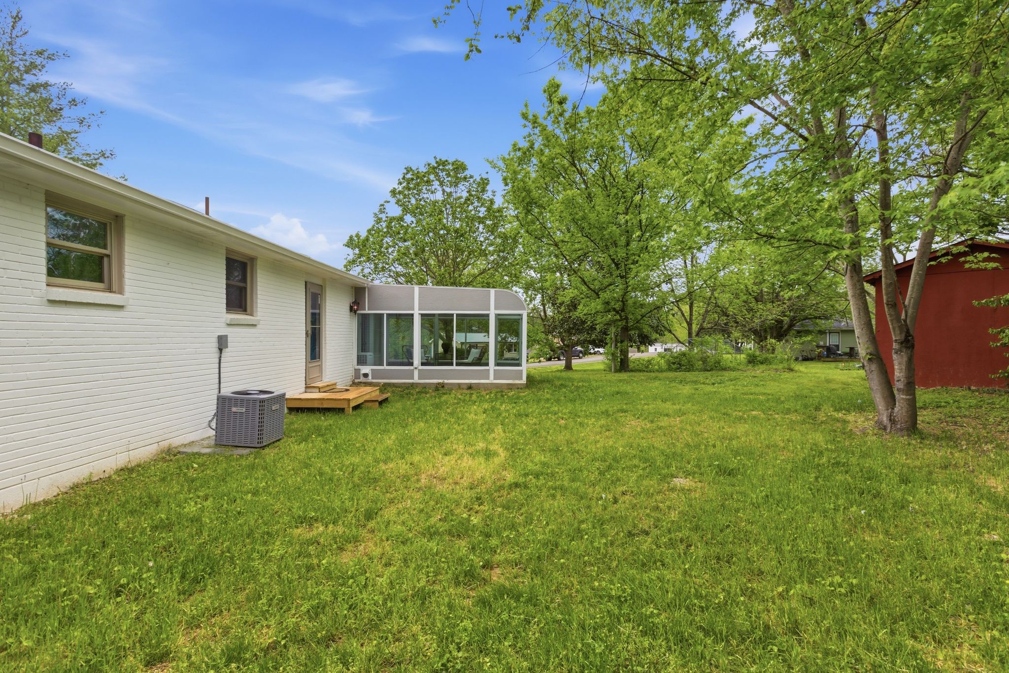 113 Mae Circle Dickson, TN 37055 - Photo 28 of 30 a backyard of a house with table and chairs