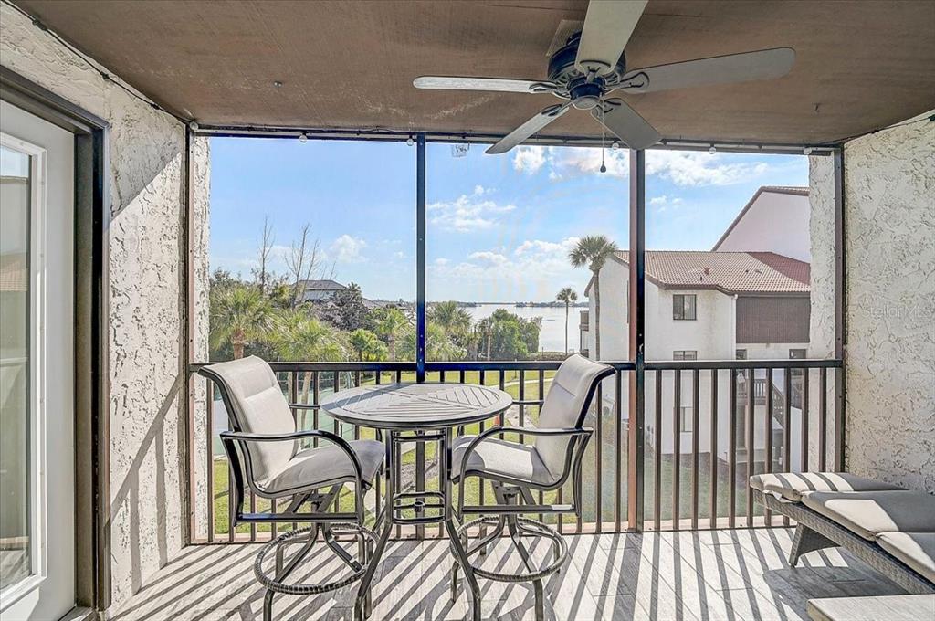 1624 Stickney Point Road, Unit 1624301 Sarasota, FL 34231 - Photo 24 of 55 a view of a balcony with furniture