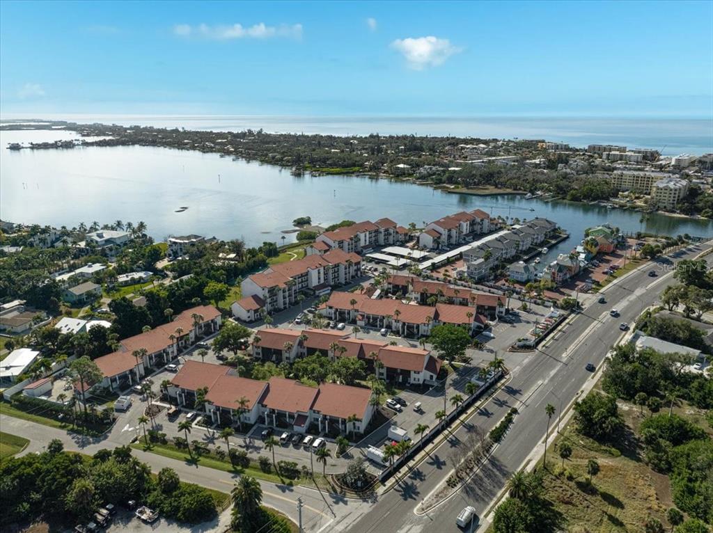 1624 Stickney Point Road, Unit 1624301 Sarasota, FL 34231 - Photo 4 of 55 an aerial view of a city