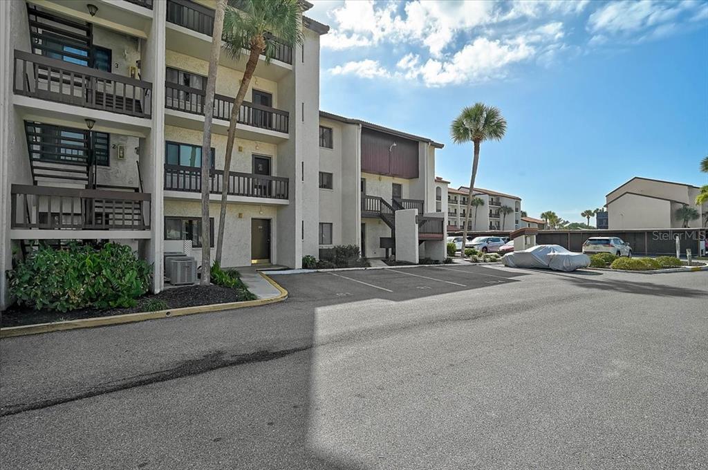 1624 Stickney Point Road, Unit 1624301 Sarasota, FL 34231 - Photo 5 of 55 a row of houses with a street