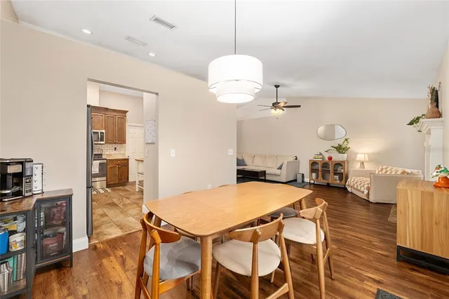 a kitchen with stainless steel appliances granite countertop a sink and stove