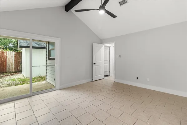 a view of an empty room and window