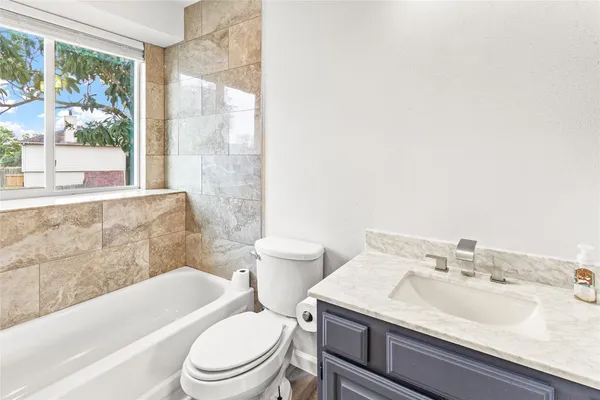 a bathroom with a sink and a toilet