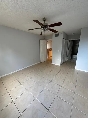 a kitchen with a stove a sink and a refrigerator