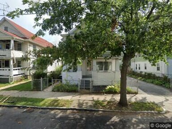 51 Lester Street Springfield, MA 01108 - Photo 1 of 1 a front view of a house with a yard