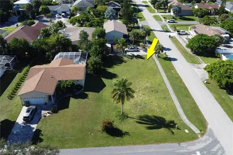 an aerial view of a house with a garden