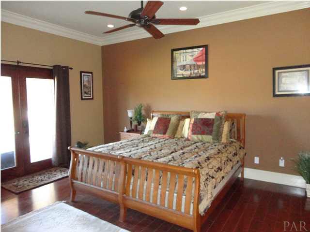 7404 San Ramon Drive Milton, FL 32583 - Photo 12 of 24 Master Bedroom with doors to back patio