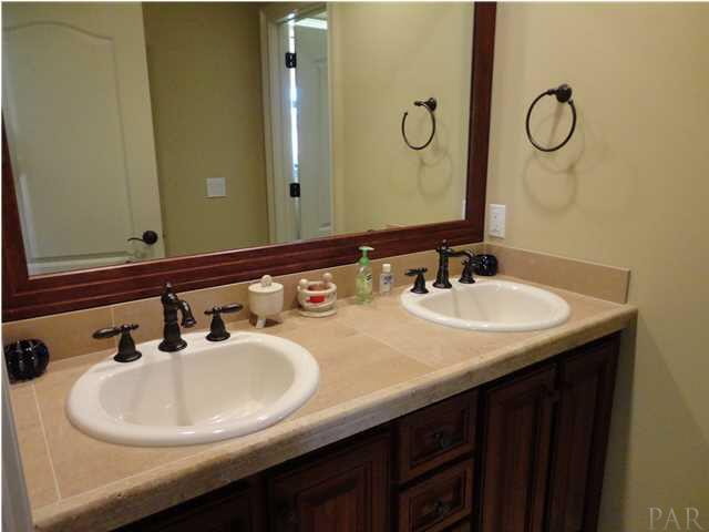 7404 San Ramon Drive Milton, FL 32583 - Photo 15 of 24 Upstairs bath with dual sinks