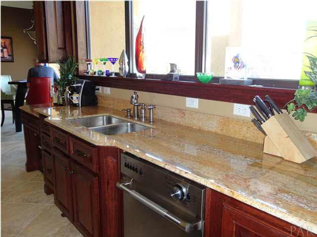 7404 San Ramon Drive Milton, FL 32583 - Photo 6 of 24 Kitchen sink overlooks patio and backyard