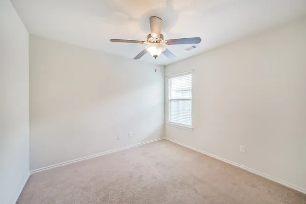 a view of a backyard with a small cabin