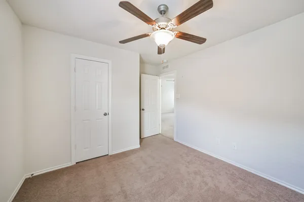 a view of a house with backyard porch and garden