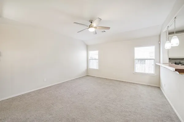 a view of a kitchen with a sink and cabinet area