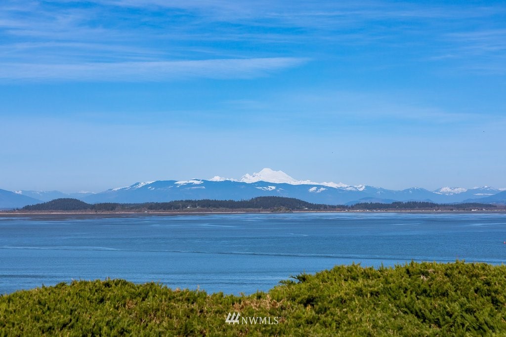 3082 Mount Baker Circle Oak Harbor, WA 98277 - Photo 1 of 40 a view of an ocean with a mountain