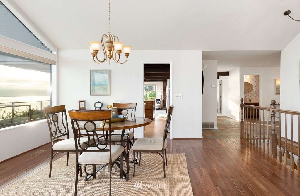 3082 Mount Baker Circle Oak Harbor, WA 98277 - Photo 15 of 40 a view of a dining room with furniture window and wooden floor