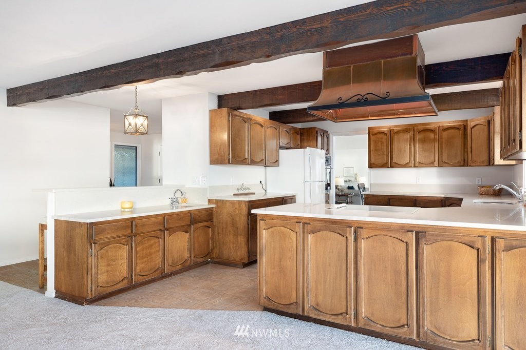 3082 Mount Baker Circle Oak Harbor, WA 98277 - Photo 20 of 40 a kitchen with white cabinets and sink