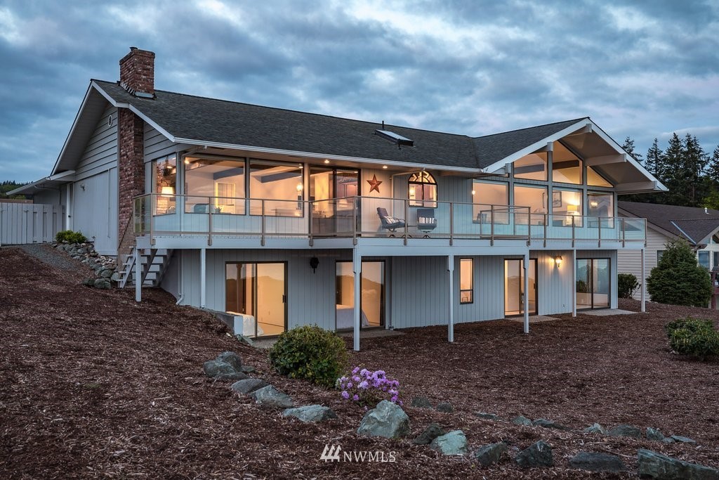 3082 Mount Baker Circle Oak Harbor, WA 98277 - Photo 31 of 40 a front view of a house with a garden