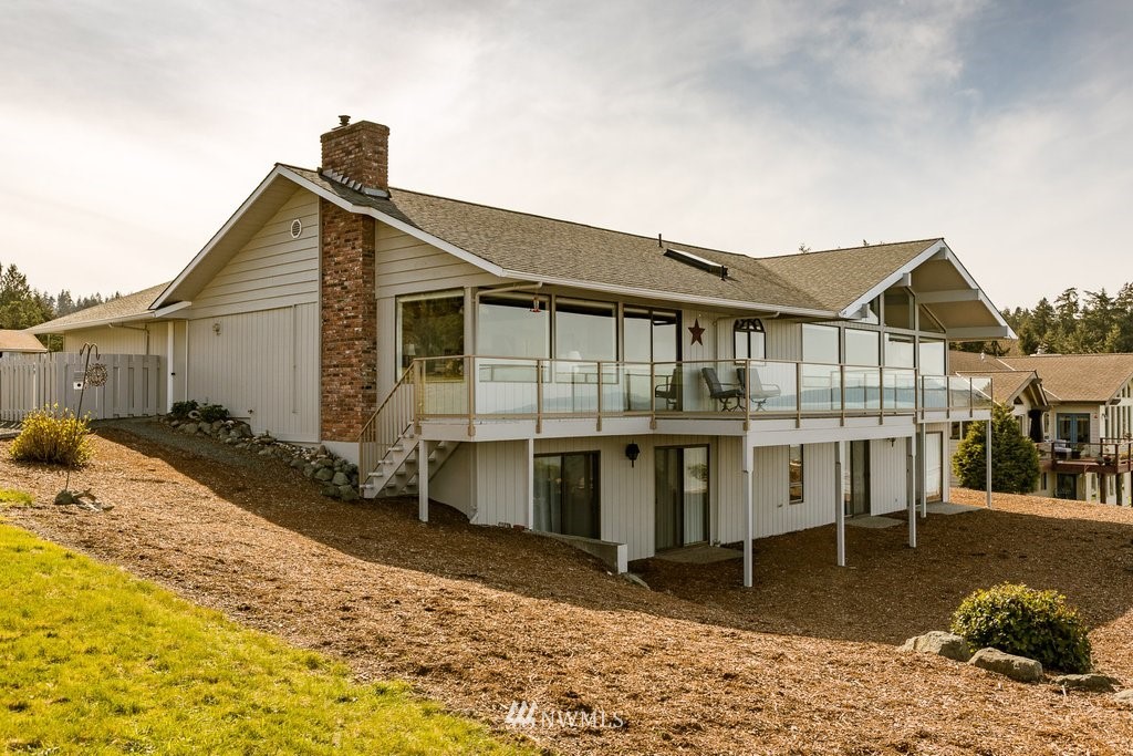 3082 Mount Baker Circle Oak Harbor, WA 98277 - Photo 37 of 40 a view of a house with a wooden deck
