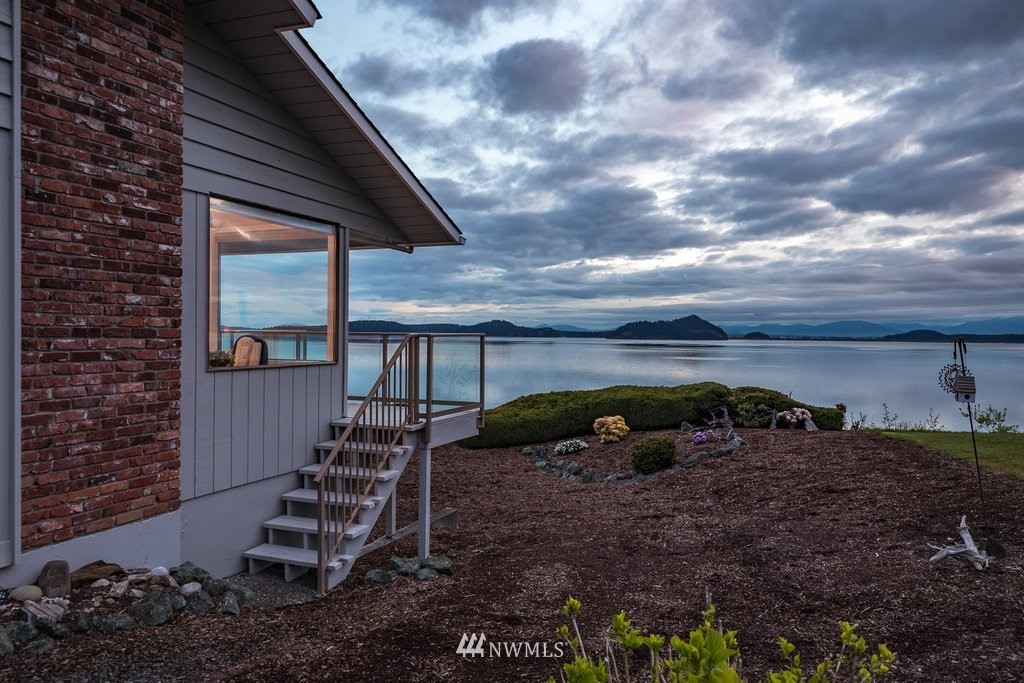 3082 Mount Baker Circle Oak Harbor, WA 98277 - Photo 9 of 40 a view of house with backyard and outdoor seating