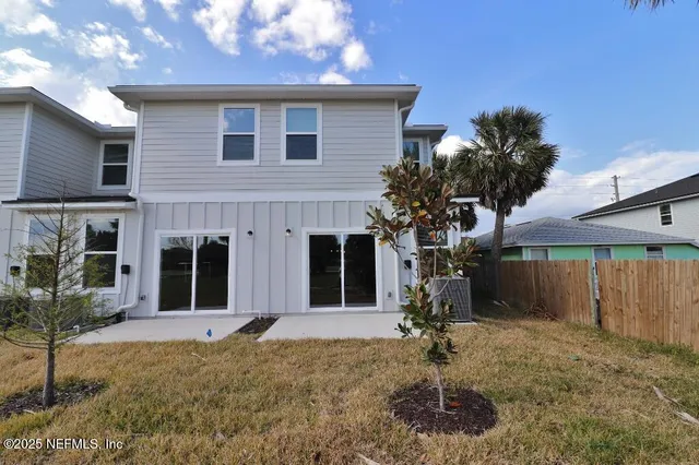 a house view with a backyard space