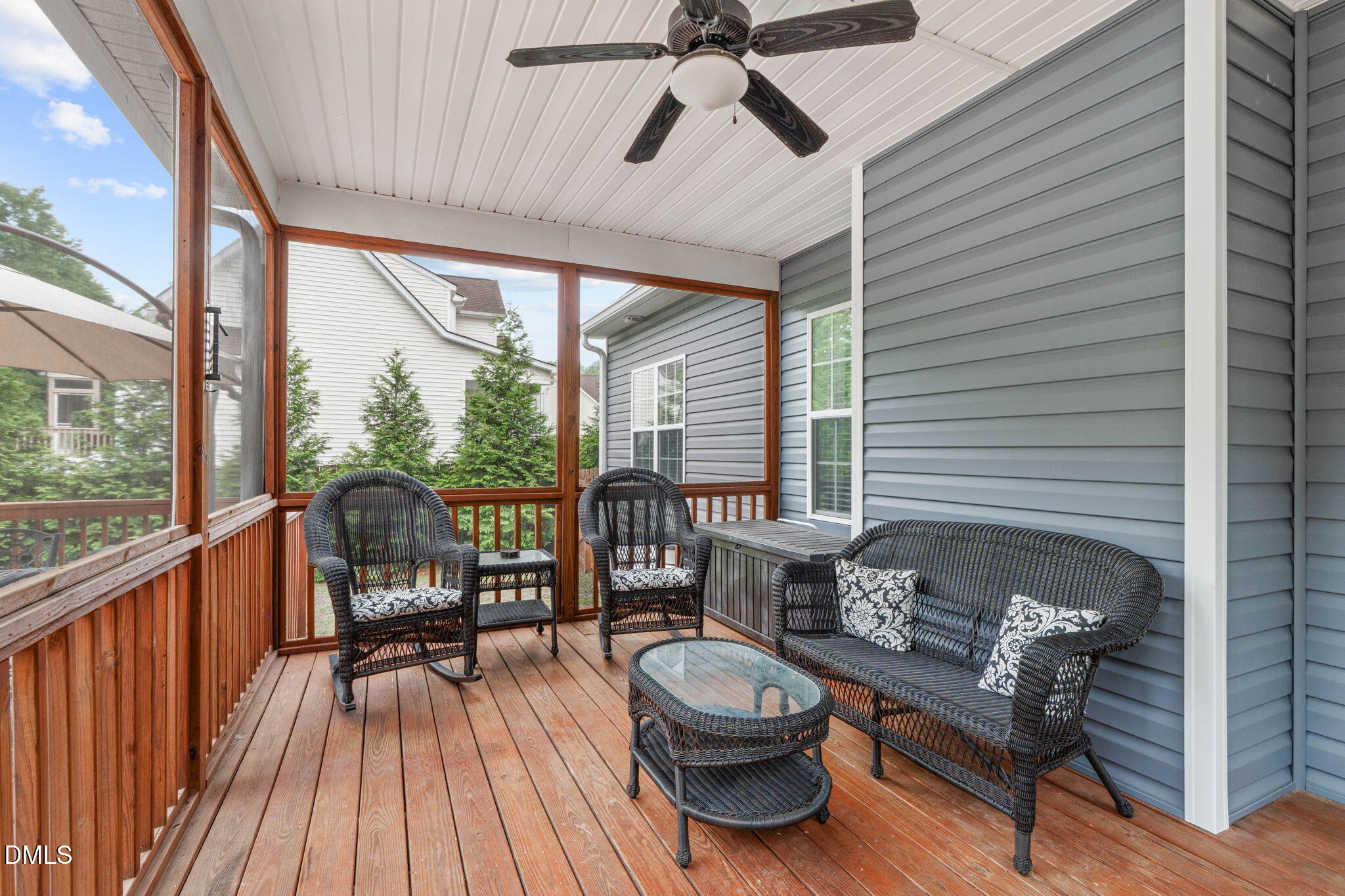 2450 Rolling Tracks Road Willow Spring, NC 27592 - Photo 45 of 64 a balcony with furniture and wooden floor
