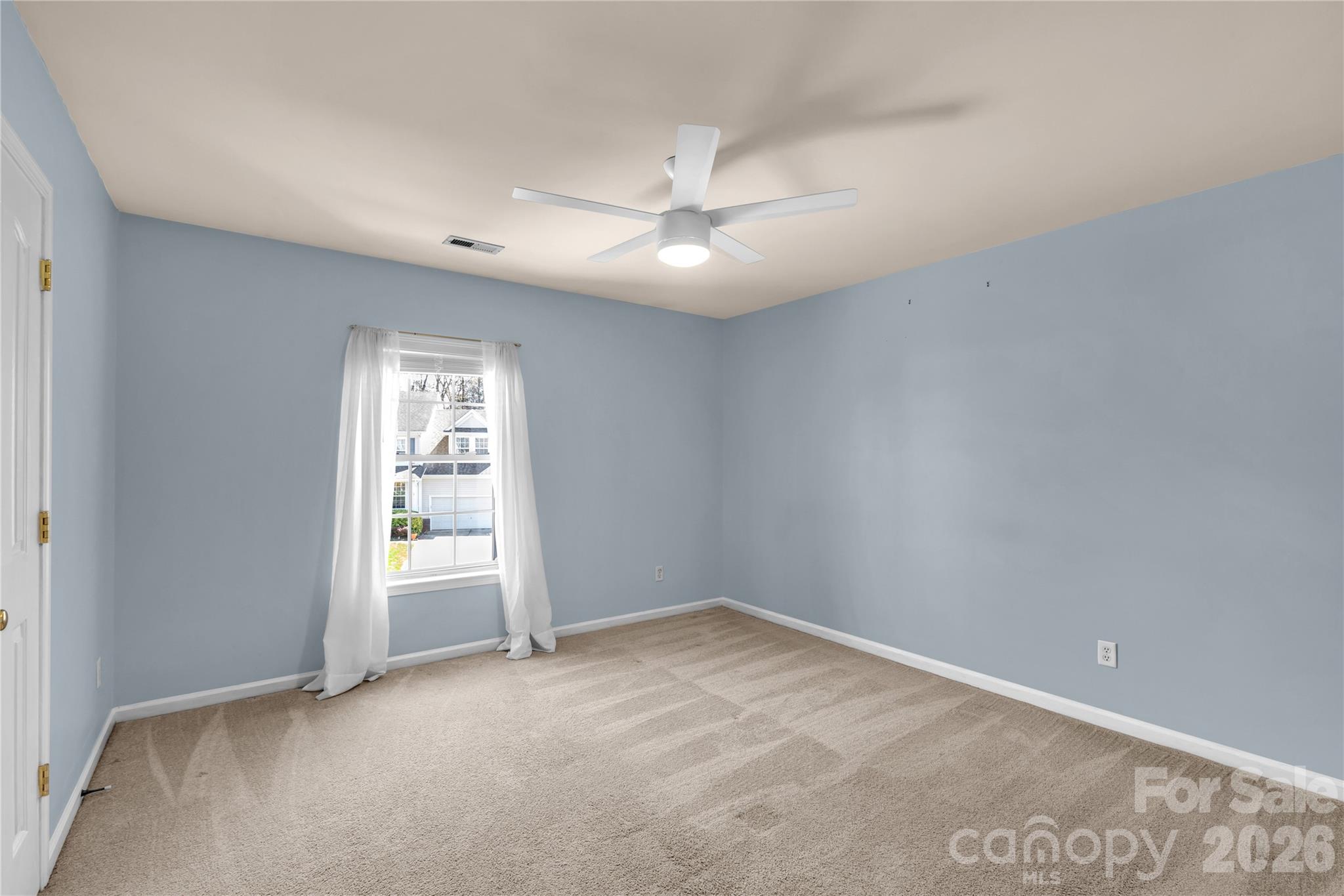 1644 Spandril Lane Fort Mill, SC 29708 - Photo 20 of 32 an empty room with windows and fan