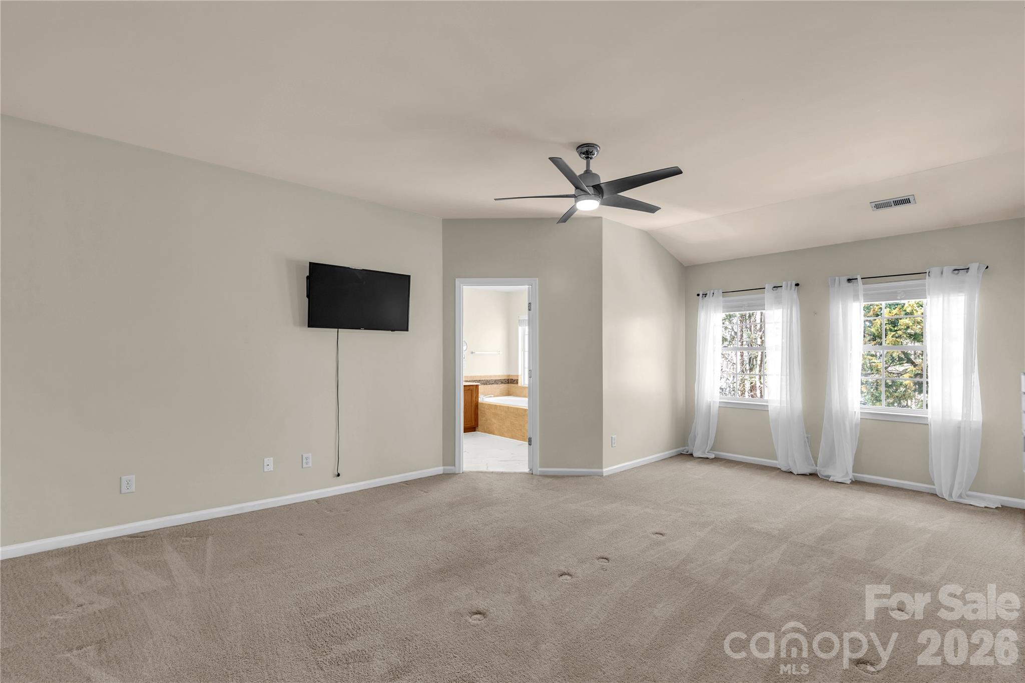 1644 Spandril Lane Fort Mill, SC 29708 - Photo 24 of 32 a view of a livingroom with a ceiling fan and window