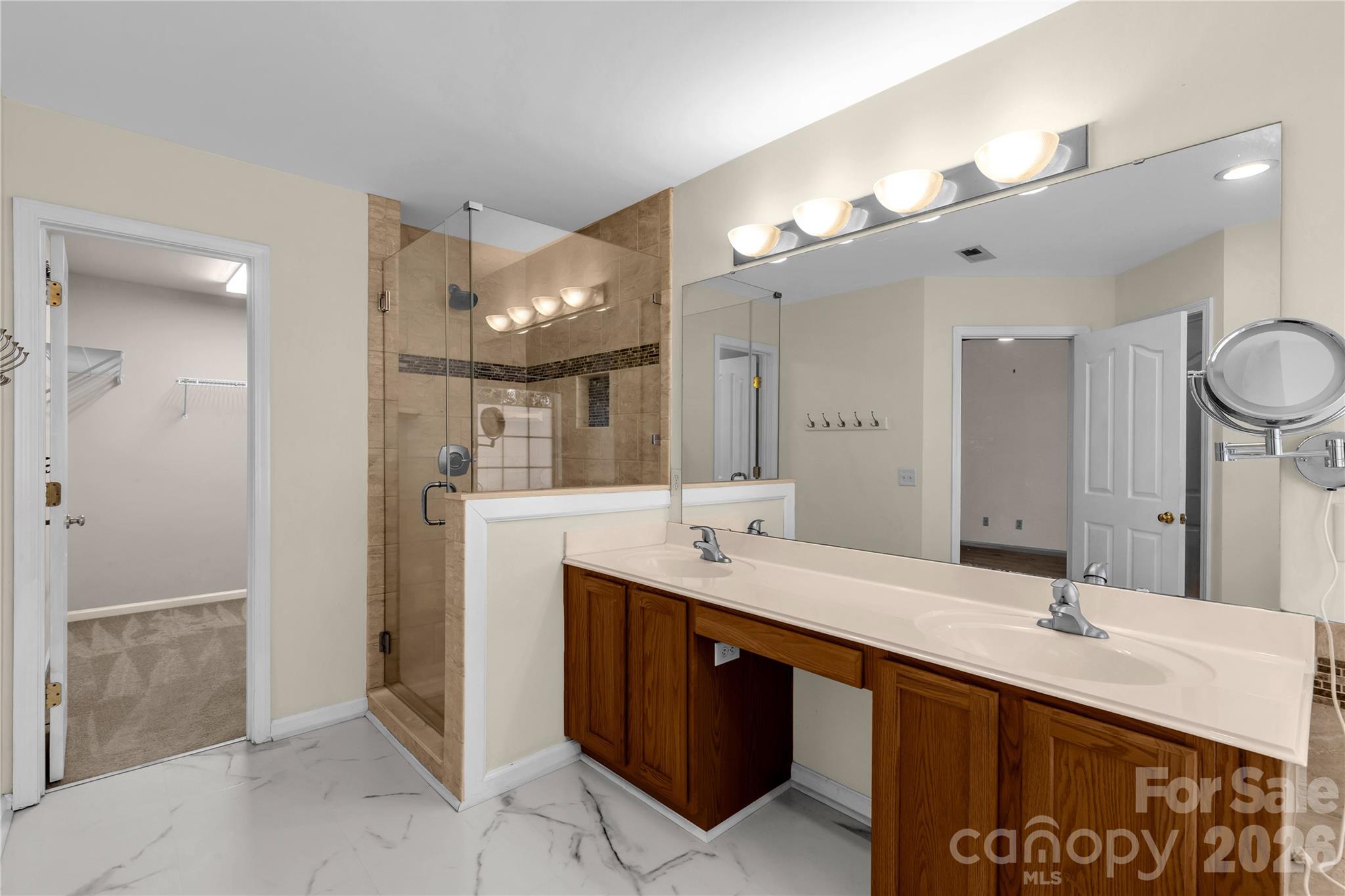 1644 Spandril Lane Fort Mill, SC 29708 - Photo 26 of 32 a bathroom with a sink double vanity and a mirror