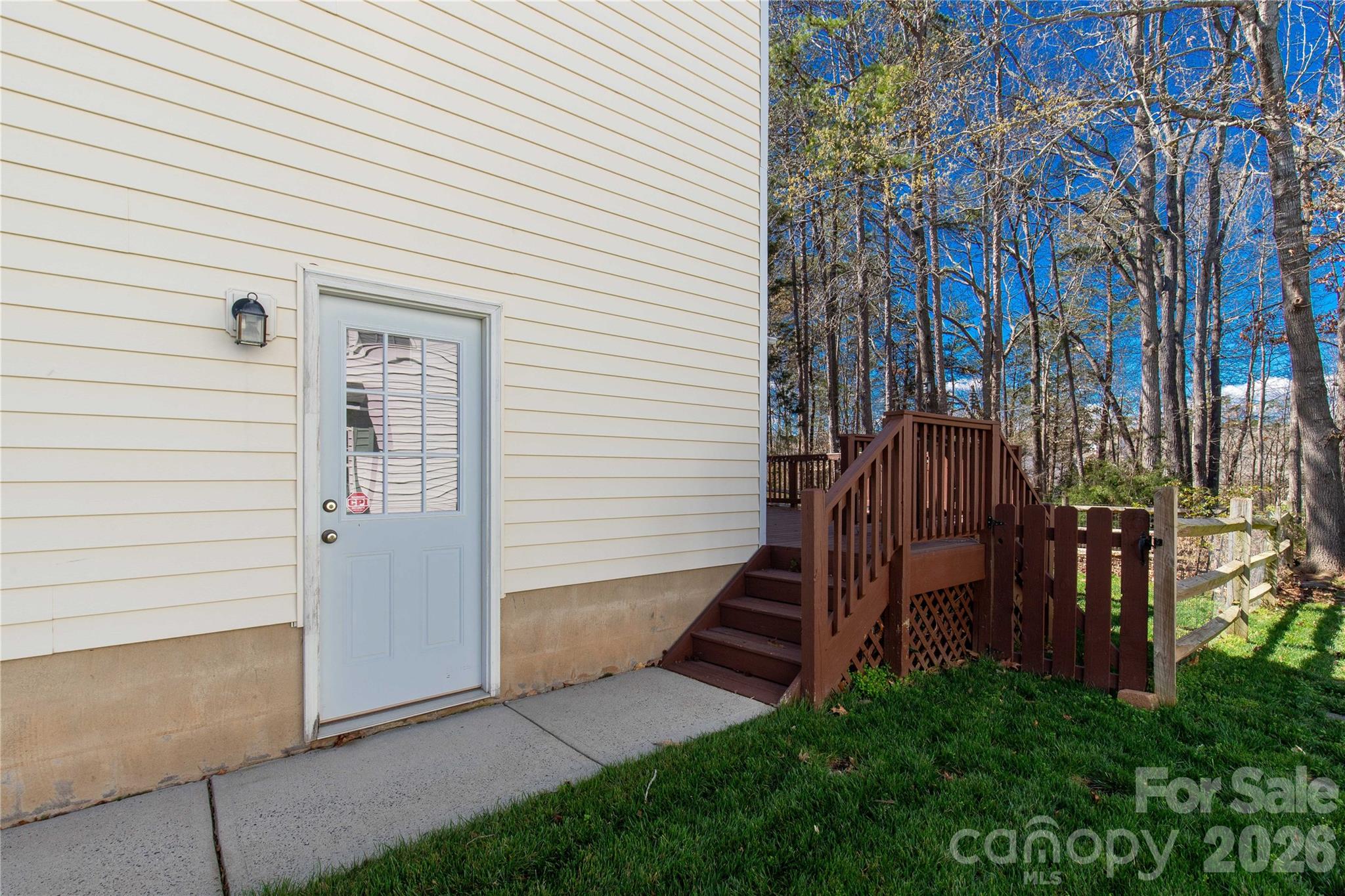 1644 Spandril Lane Fort Mill, SC 29708 - Photo 30 of 32 a view of a house with backyard and wooden fence