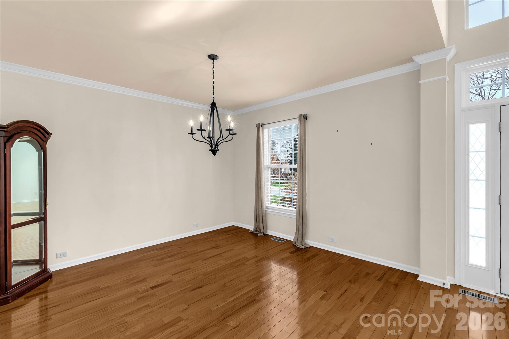 1644 Spandril Lane Fort Mill, SC 29708 - Photo 6 of 32 a view of empty room with wooden floor and fan