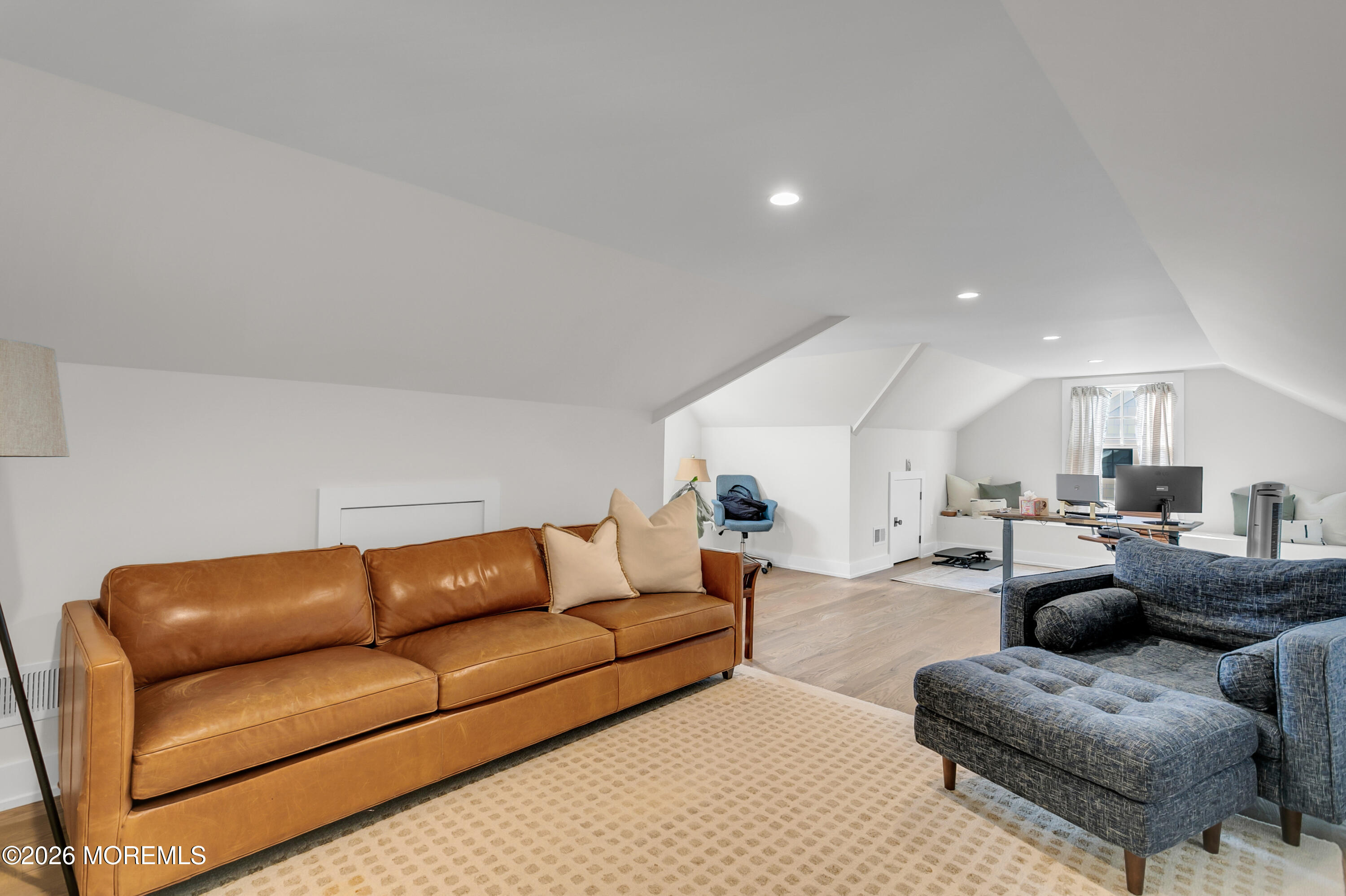 61 Center Street Rumson, NJ 07760 - Photo 23 of 30 a living room with furniture and a couch