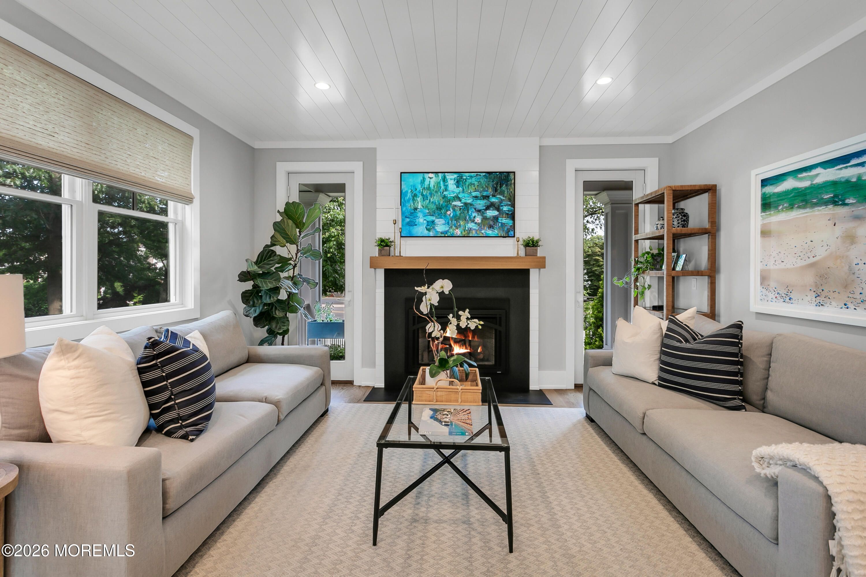 61 Center Street Rumson, NJ 07760 - Photo 6 of 30 a living room with furniture or couch and a fireplace