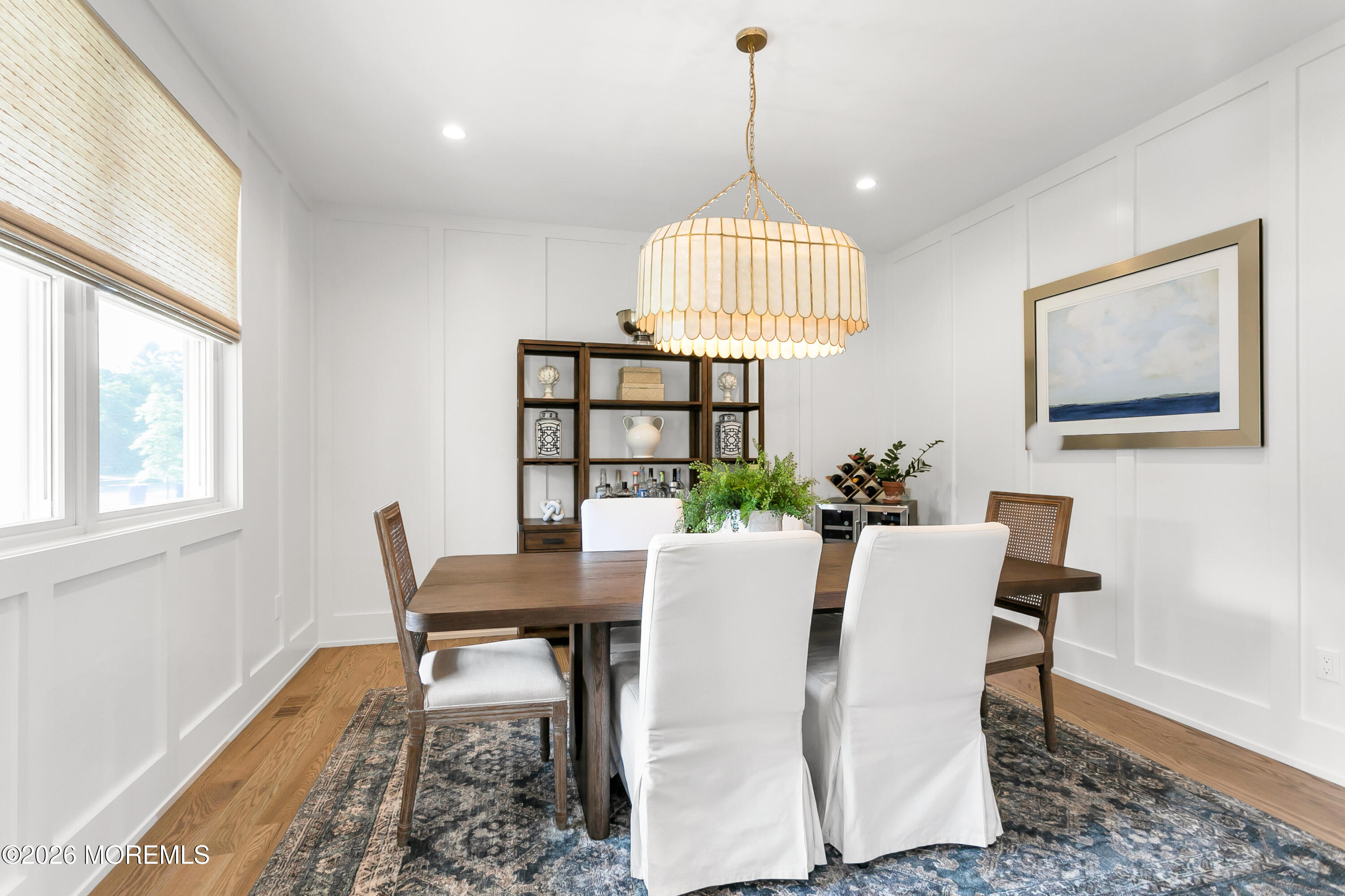 61 Center Street Rumson, NJ 07760 - Photo 8 of 30 a view of a dining room with a table and chairs