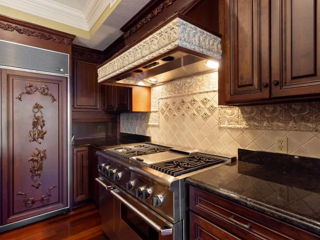 a bathroom with a toilet a sink and shower