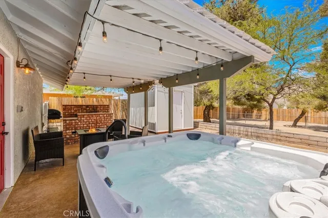 a kitchen with a sink and a large window