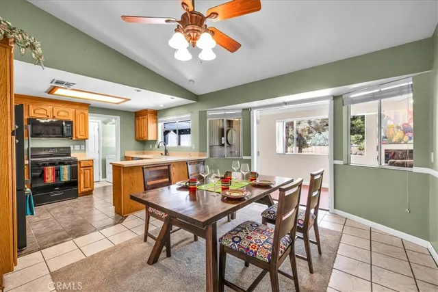 a bedroom with furniture and a chandelier