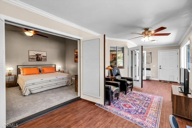 a bathroom with a sink a mirror a vanity and a shower