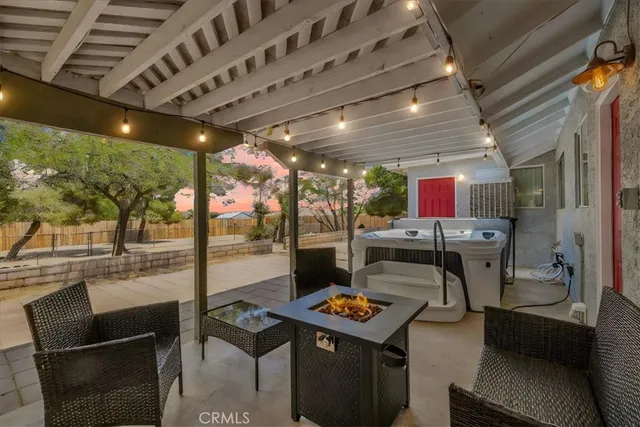 a view of a chairs and table in a room